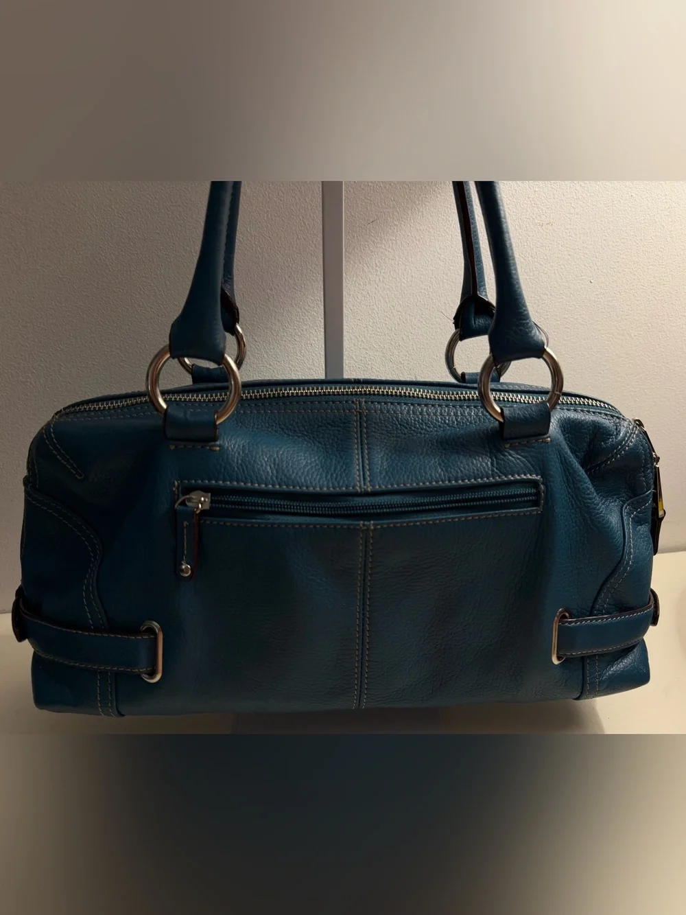 Tignanello teal blue pebbled leather satchel with silver toned hardware.